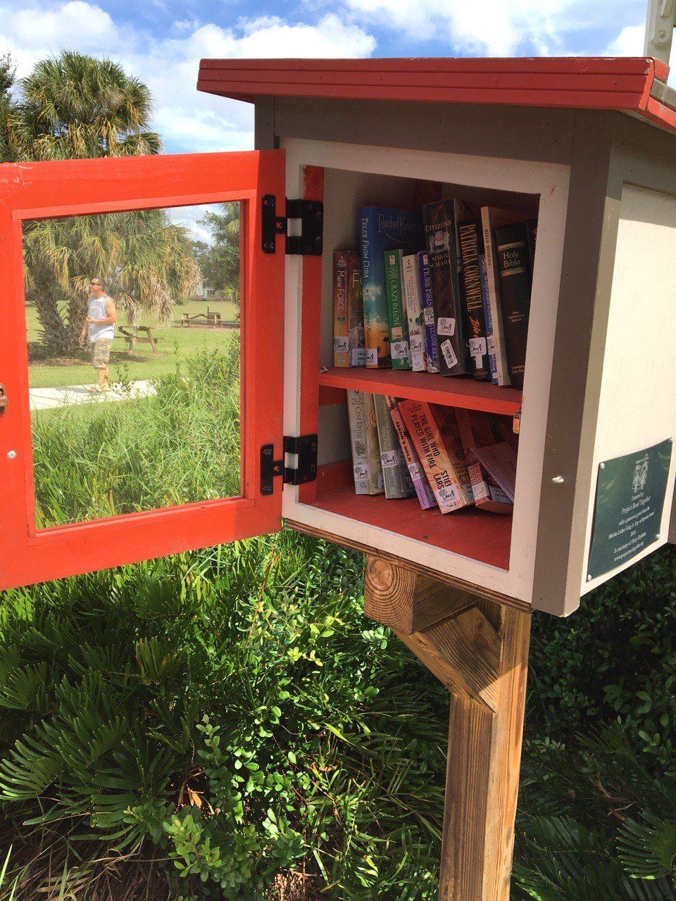 Volunteers at a Little Free Library installation, 2017